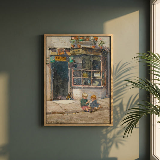 Cobbler's Shop, Knightsbridge framed print in a natural oak frame on a dark green wall beside a window, dappled plant shadow