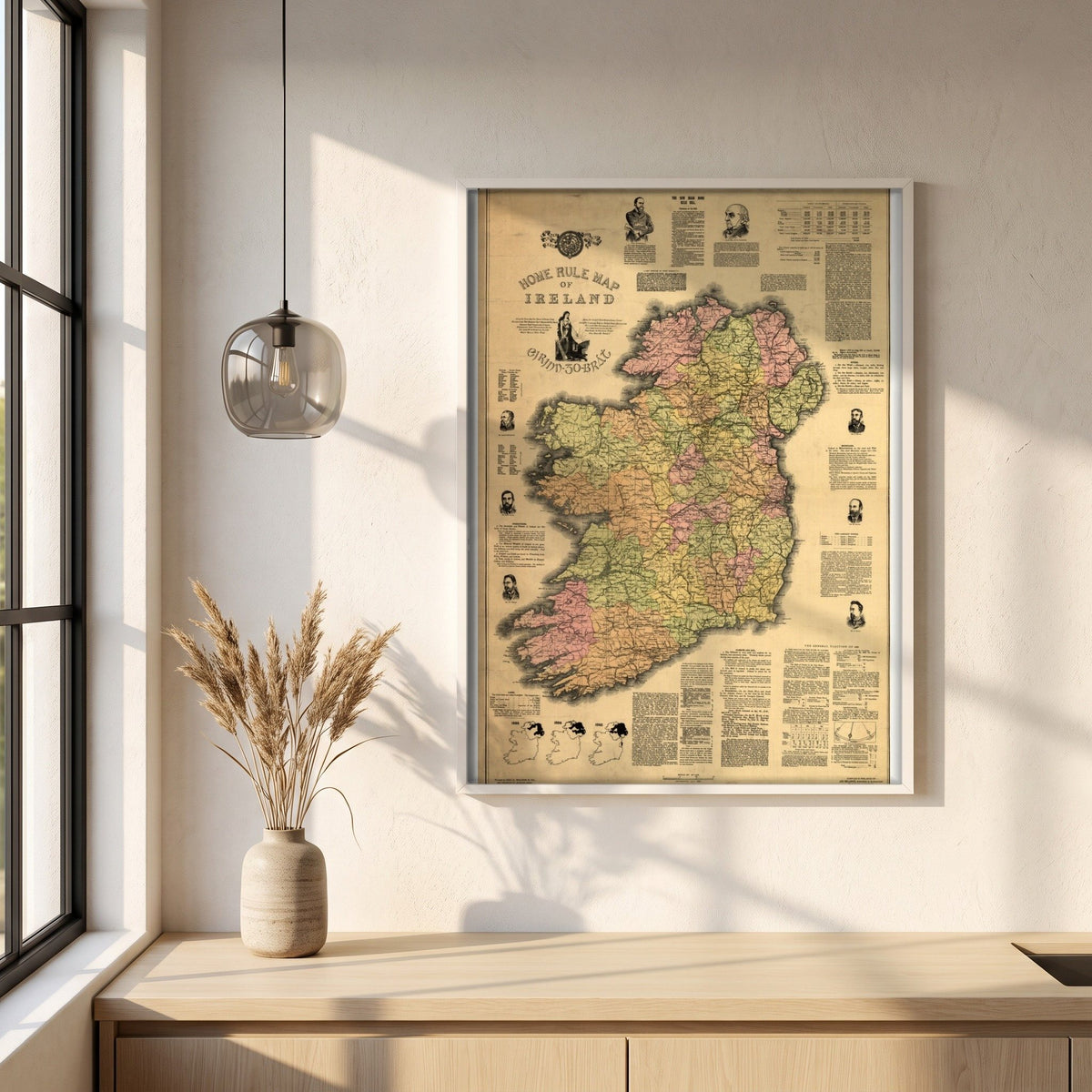 Home Rule Map of Ireland 1893 framed print in a white frame on a plaster wall above an oak worktop in a bright Scandinavian kitchen