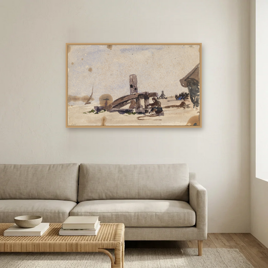 A Kneeling Man on the Beach art print, framed and hung in a living room