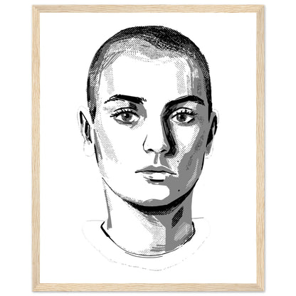Sinéad O'Connor black and white portrait print in an oak frame, close-cropped hair and direct gaze