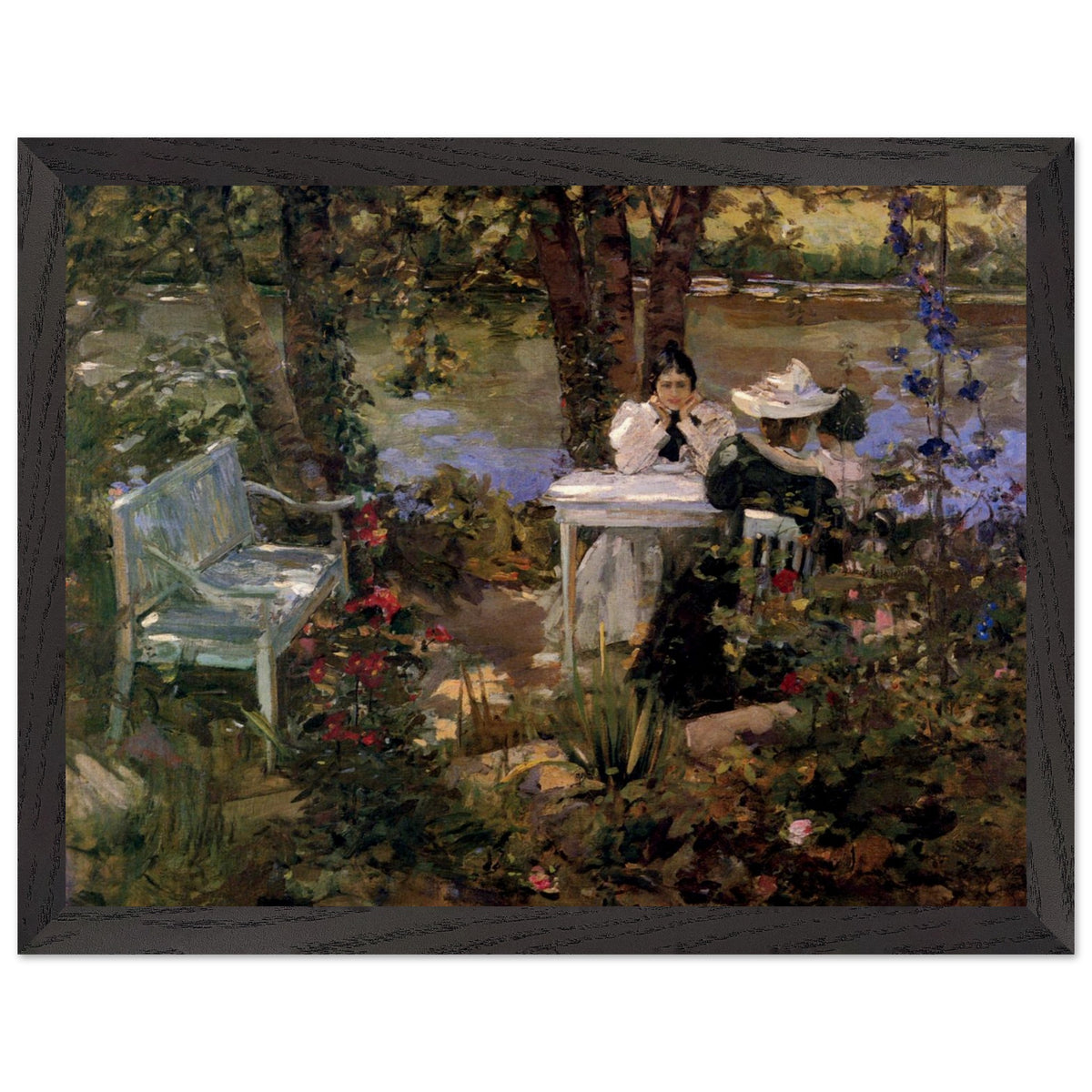A Garden in France by Sir John Lavery in a black frame, garden bench and flowers by a river