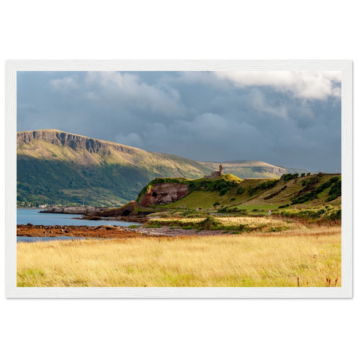 This mesmerising artwork captures the rugged beauty of one of the world's most scenic drives, the Causeway Coastal Route (A2), with a focal point on the medieval marvel, Red Bay Castle.