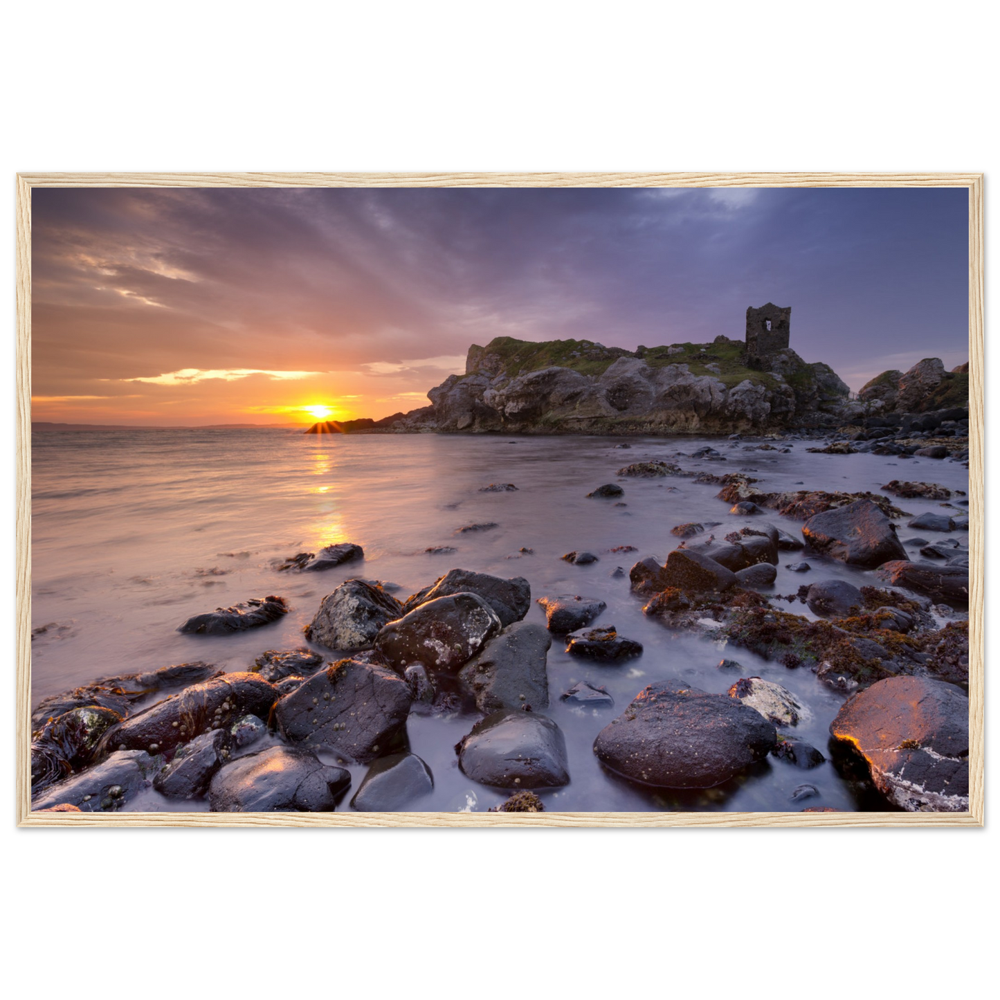 Framed wall art print of Kinbane Castle showcasing dramatic cliffside ruins above the North Atlantic waves. Perfect for adding a touch of Irish history and coastal charm to any space. Ideal for history lovers and those who appreciate Ireland's ancient beauty.