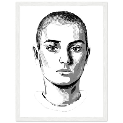 Sinéad O'Connor black and white portrait print in a white frame, close-cropped hair and direct gaze