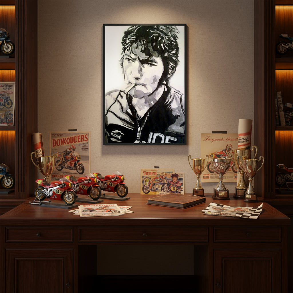 Framed Joey Dunlop print above a desk with racing memorabilia, model bikes and vintage racing posters, dark wood furniture, subtle spotlighting.