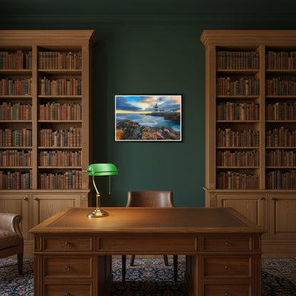 Heritage library with dark green walls and oak shelves; Hook Head Lighthouse in black frame above a writing desk with brass lamp.