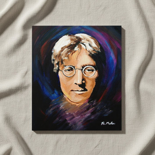 John Lennon portrait print resting on crumpled linen