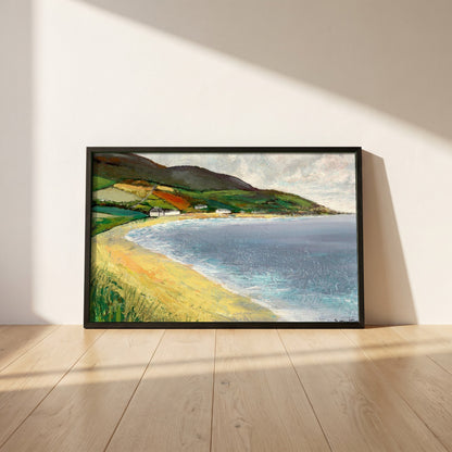Cushendun Beach, County Antrim framed print in a black frame leaning against a white plaster wall on oak floorboards in morning light