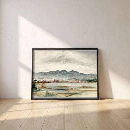 Belfast from Bunker's Hill by John O'Connor framed print in a black frame leaning against a white plaster wall on oak floorboards in morning light