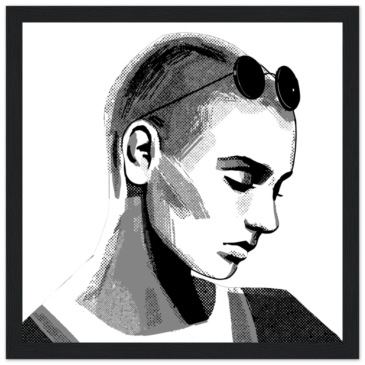 Sinéad O'Connor black and white portrait print in a wide black frame, straight-on view