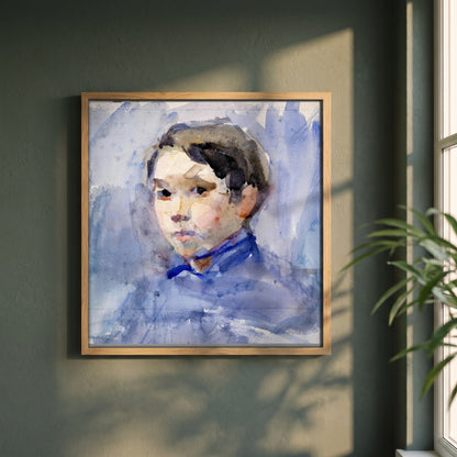 Head of a Young Boy by Clare Marsh framed print in a natural oak frame on a dark green wall beside a window, dappled plant shadow