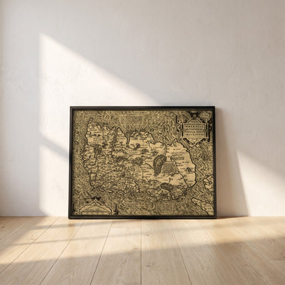 Hiberniae, Britannicae Insvlae nova descripto Ireland map framed print in a black frame leaning against a white plaster wall on oak floorboards in morning light