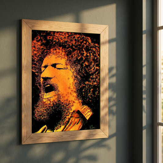 Luke Kelly framed print in a natural oak frame on a dark green wall beside a window, dappled plant shadow