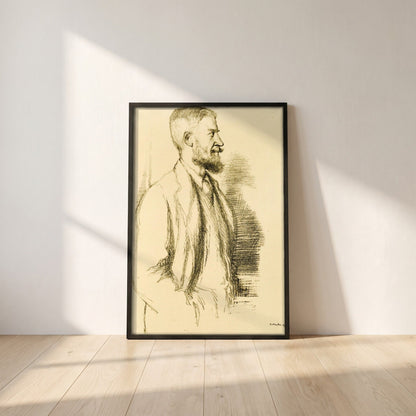 Mr George Bernard Shaw (1897) by William Rothenstein framed print in a black frame leaning against a white plaster wall on oak floorboards in morning light