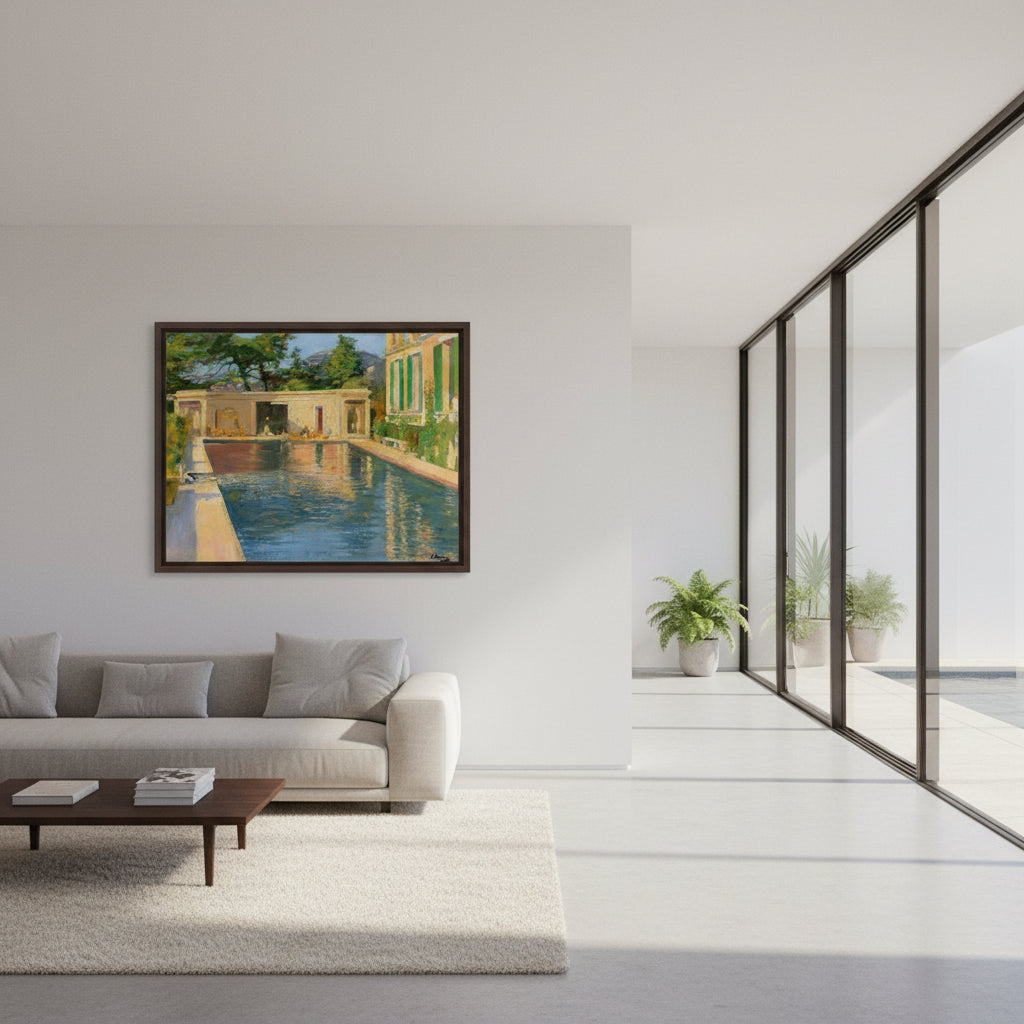 Lavery swimming pool print in a dark frame above a grey sofa in a glass-walled living room
