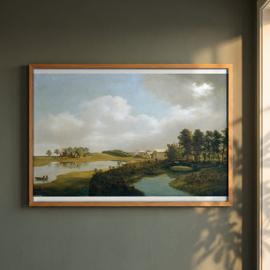 The Mill, Ballinrobe framed print in a natural oak frame on a dark green wall beside a window, dappled plant shadow