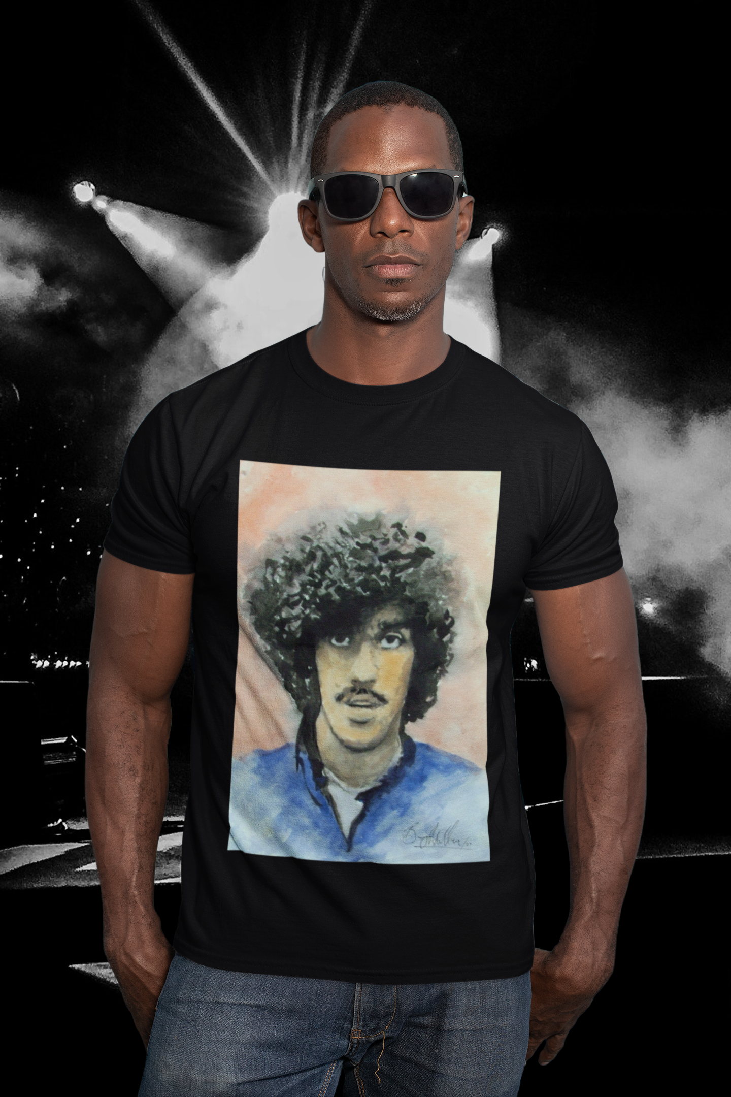 Phil Lynott tribute T-shirt: Black, featuring iconic Thin Lizzy frontman graphic. Comfortable, durable fabric, perfect for rock music lovers and fans. Ideal gift or unique wardrobe addition. Celebrate Irish rock heritage and Phil Lynott's legendary style.